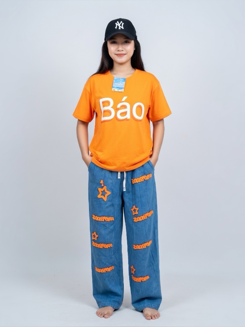 Orange T-Shirt and Blue Jeans with Star Patches